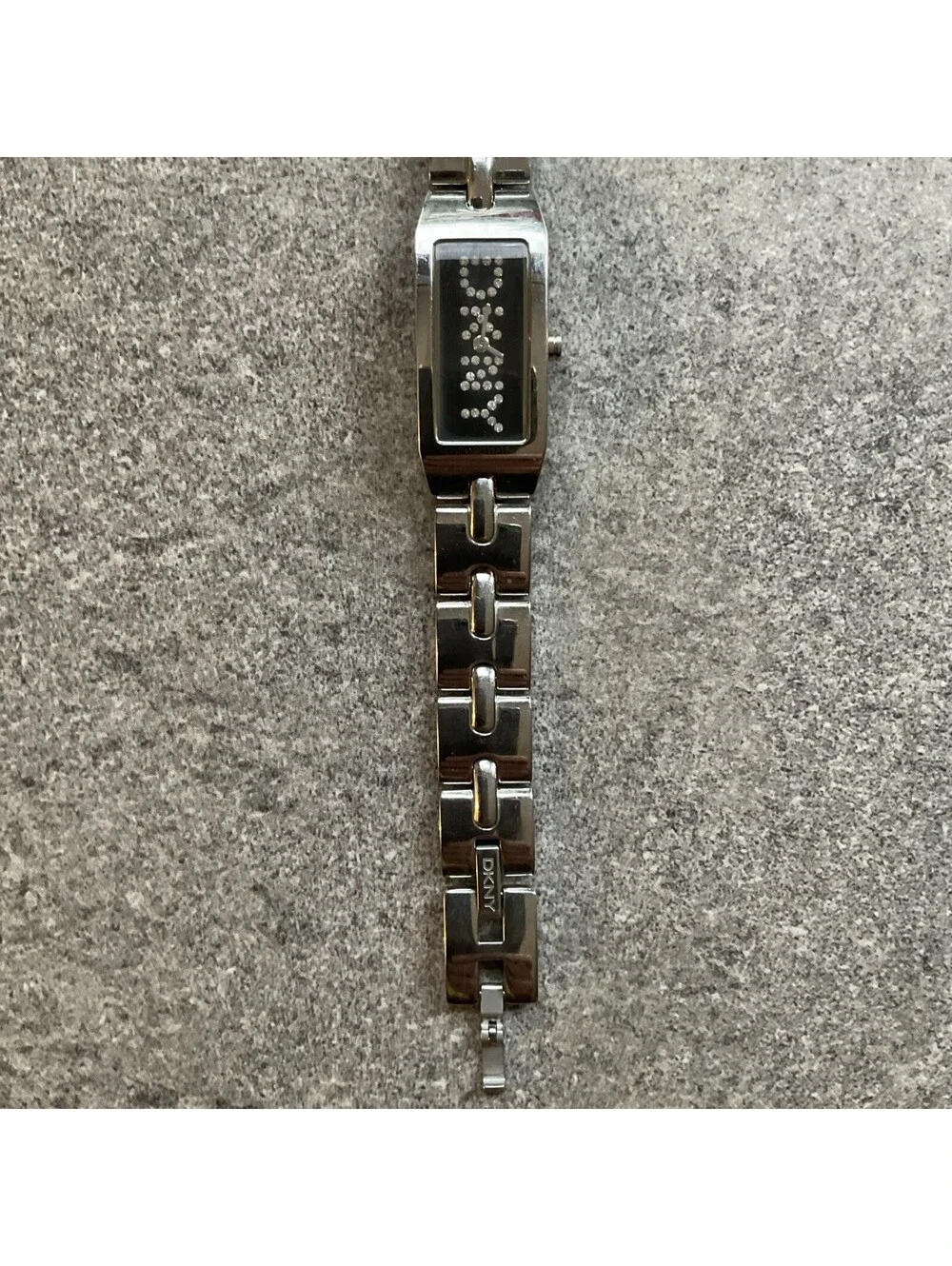 DKNY Womens Tank Style Watch 16mm Silver Tone Case & Band Black Dial B-I